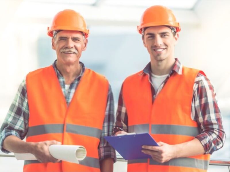 two workers wearing a safety hat